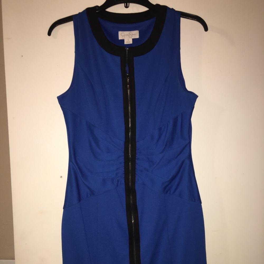 Slimming Royal blue zip dress w/black trim.